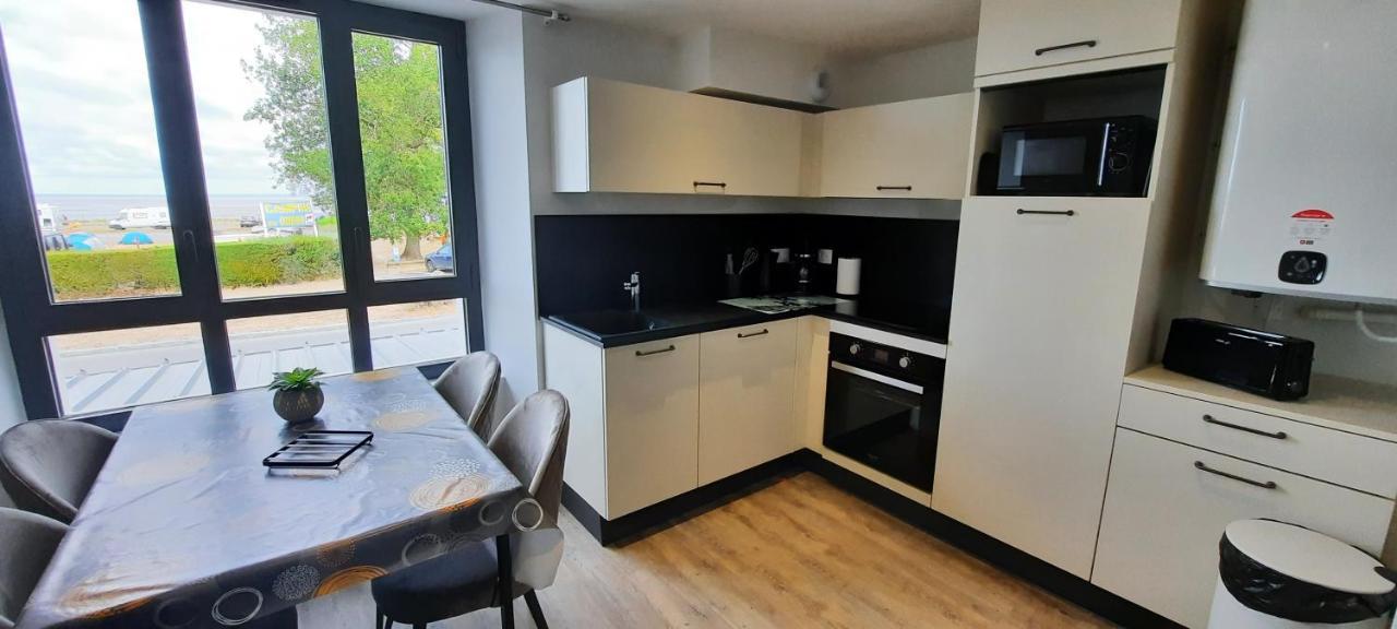 Les Appartements De La B Saint-Benoît-des-Ondes Esterno foto