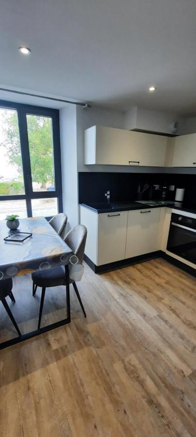 Les Appartements De La B Saint-Benoît-des-Ondes Esterno foto